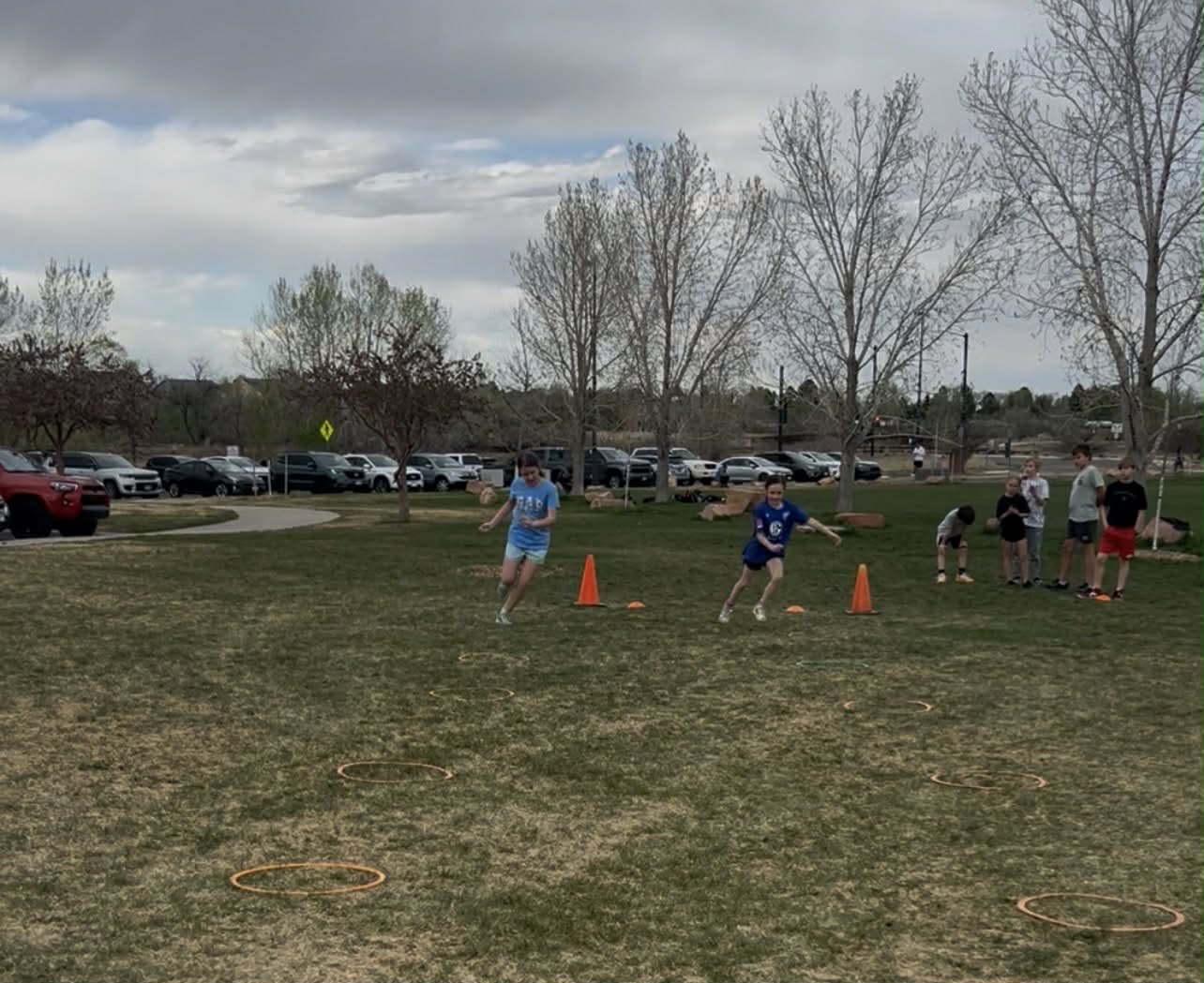 Youth outdoor cone drill training